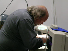 Dr. Rod testing the "Rod Chip" which provides the MIL-STD-1553B interface to the Lunar Orbiter Laser Altimeter instrument.